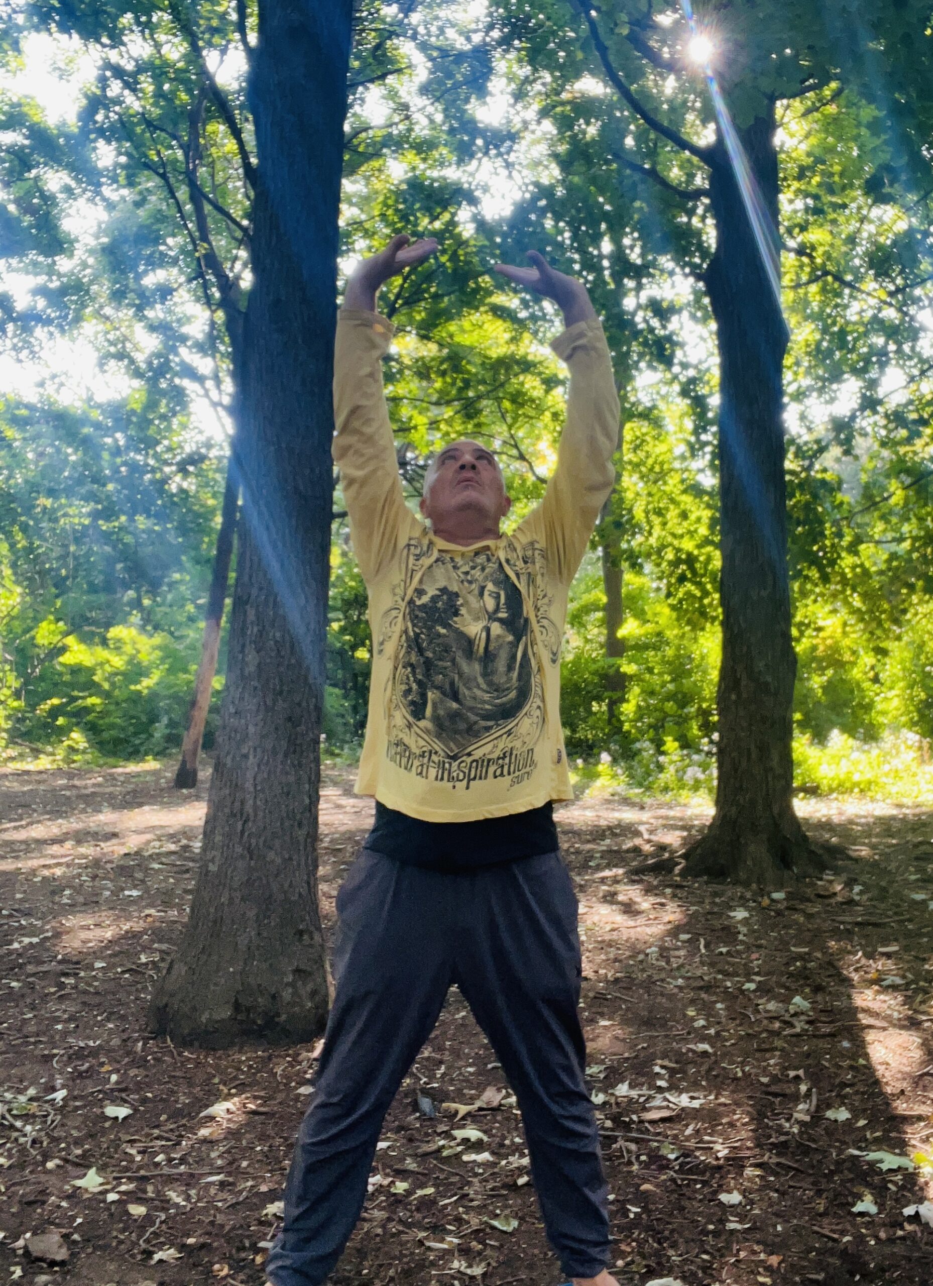 Pierre Perpall jr doing a Qi Gong session in the park